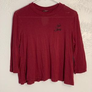 Dark Red Flowy Shirt With 3/4 Sleeves and Wording
